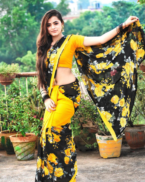 Cute Dipika Rana Pictures In Yellow And Black Saree